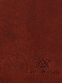 Brown bi-fold travel wallet