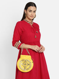 Yellow golden and silver zari embroidered potli bag