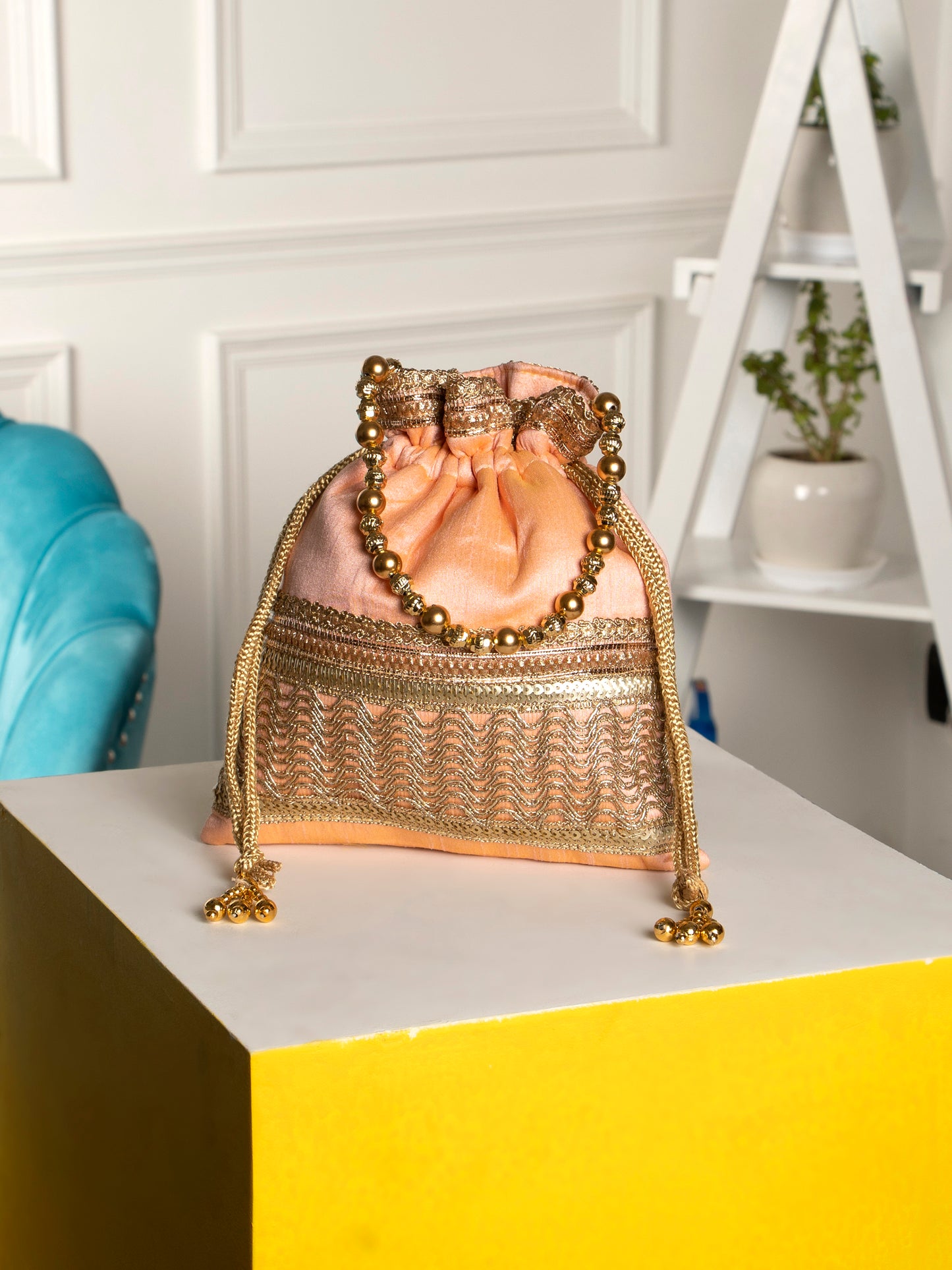 Peach color square poly silk potli bag
