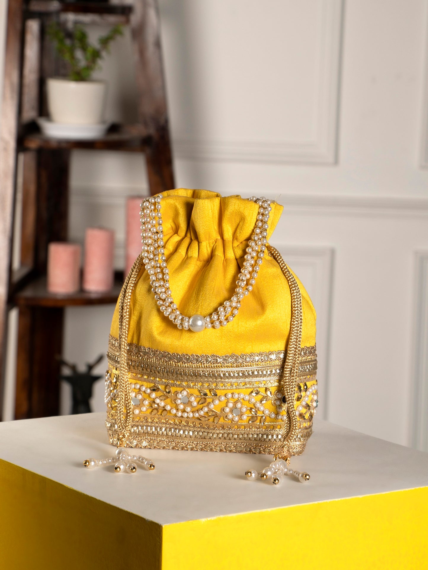 Yellow embellished poly silk potli bag