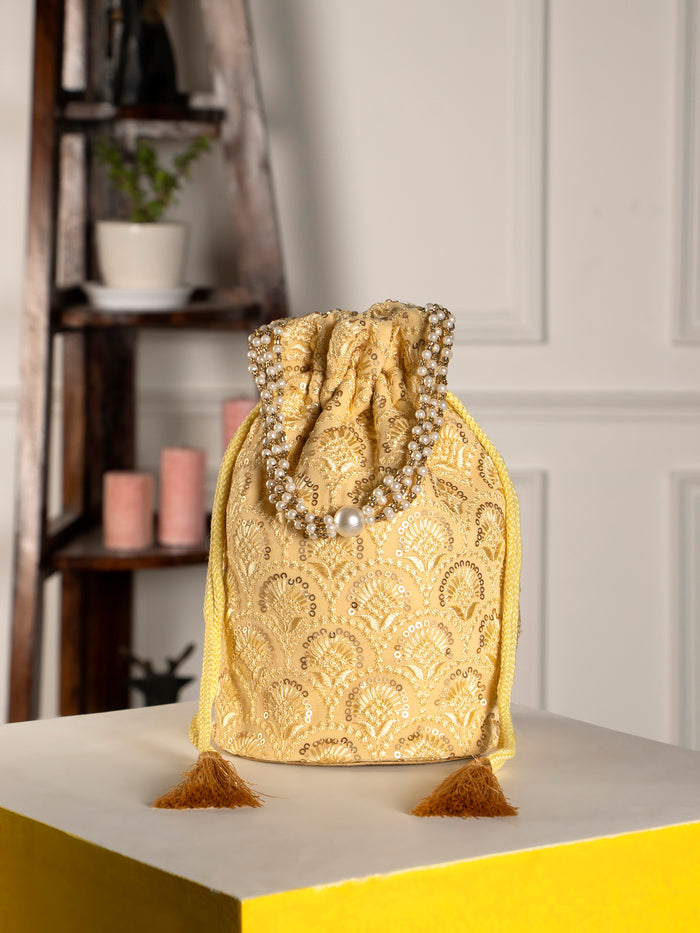 Yellow embroidered chikankari potli bag